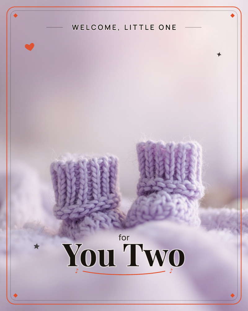 A pair of tiny knitted booties in soft lavender sit atop a rumpled fabric surface, their ribbed cuffs catching a hazy backlight, a new baby e-card design