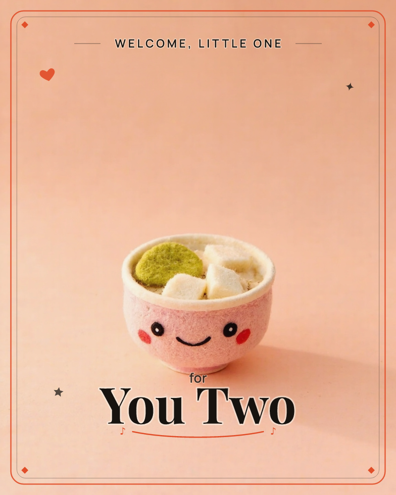 A small pink ceramic bowl with a smiling face, rosy cheeks, dot eyes, a curved little mouth, sits filled with pale marshmallow-like cubes and a swirl…, a new baby e-card design