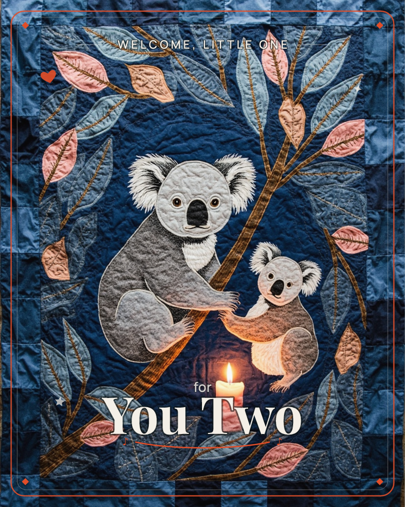A quilted textile illustration shows two koalas perched on a branch against a deep navy patchwork background, surrounded by appliquéd eucalyptus leaves…, a new baby e-card design