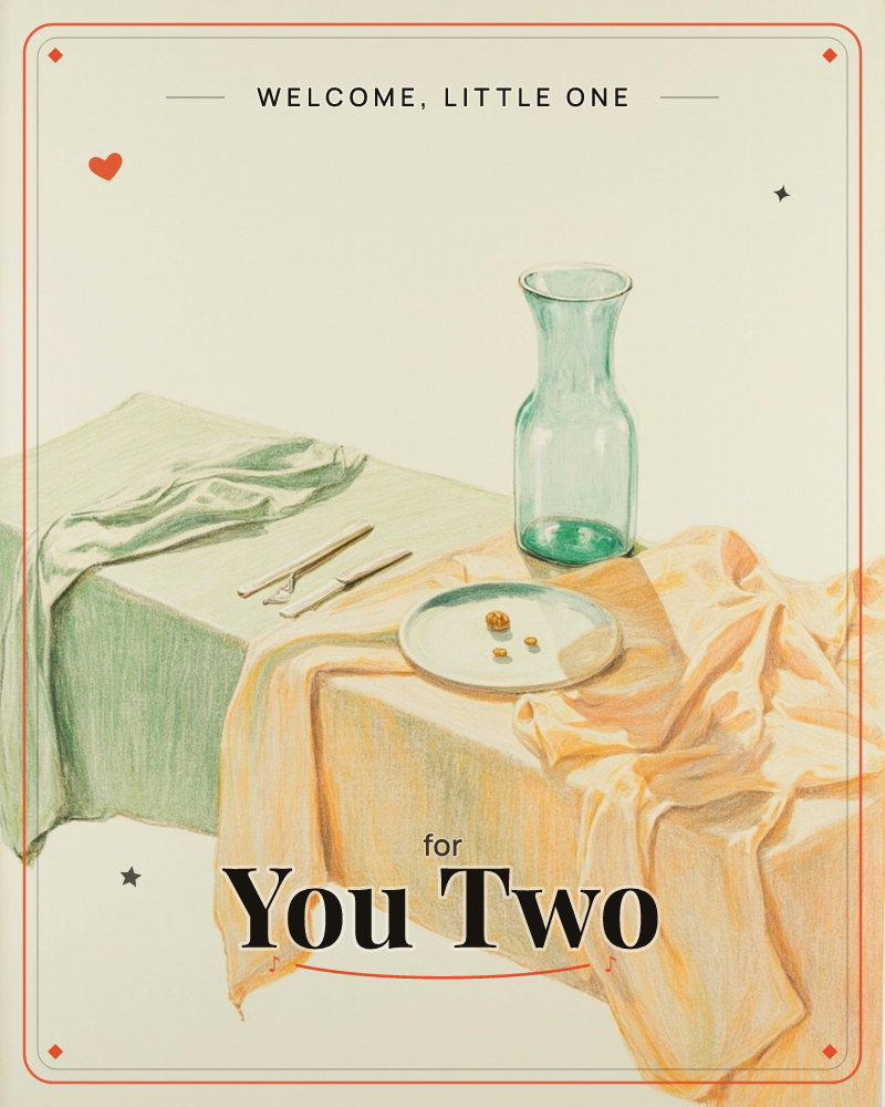 A quiet still life of a table draped in two cloths, one sage green and one warm apricot, both rumpled into soft folds, a new baby e-card design
