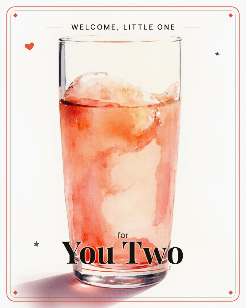 A tall glass filled with a pink-orange drink and clinking ice cubes sits alone against a plain white background, a new baby e-card design