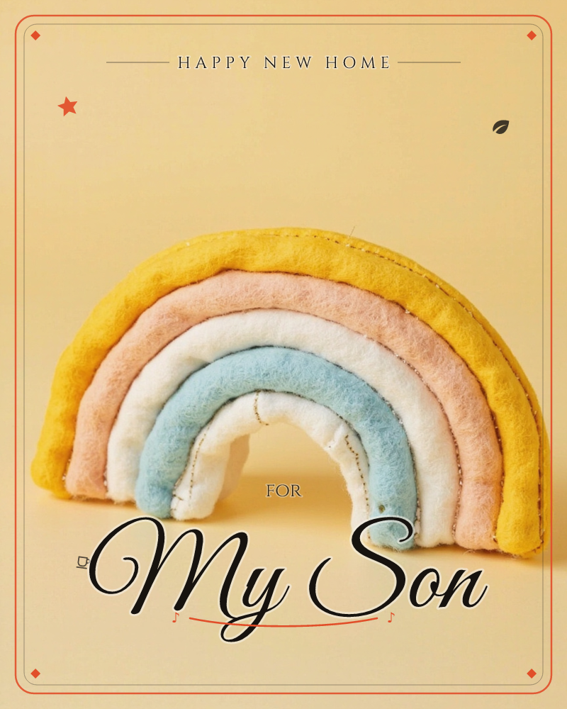 A plush fabric rainbow sits against a warm mustard-yellow backdrop, its stitched arcs of gold, blush pink, cream, and dusty blue softly padded and stuffed, a new home e-card design