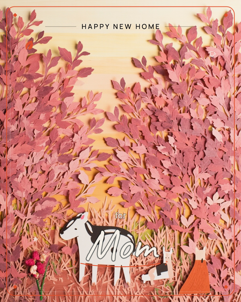 A layered paper-craft woodland scene shows a black-and-white cow standing among cut-paper grasses, flanked by a small resting animal and a fox-like…, a new home e-card design