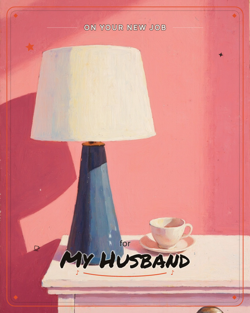 A table lamp with a navy blue base and cream shade stands on a pale pink dresser, next to a white teacup and saucer, all set against a bold pink wall…, a new job e-card design