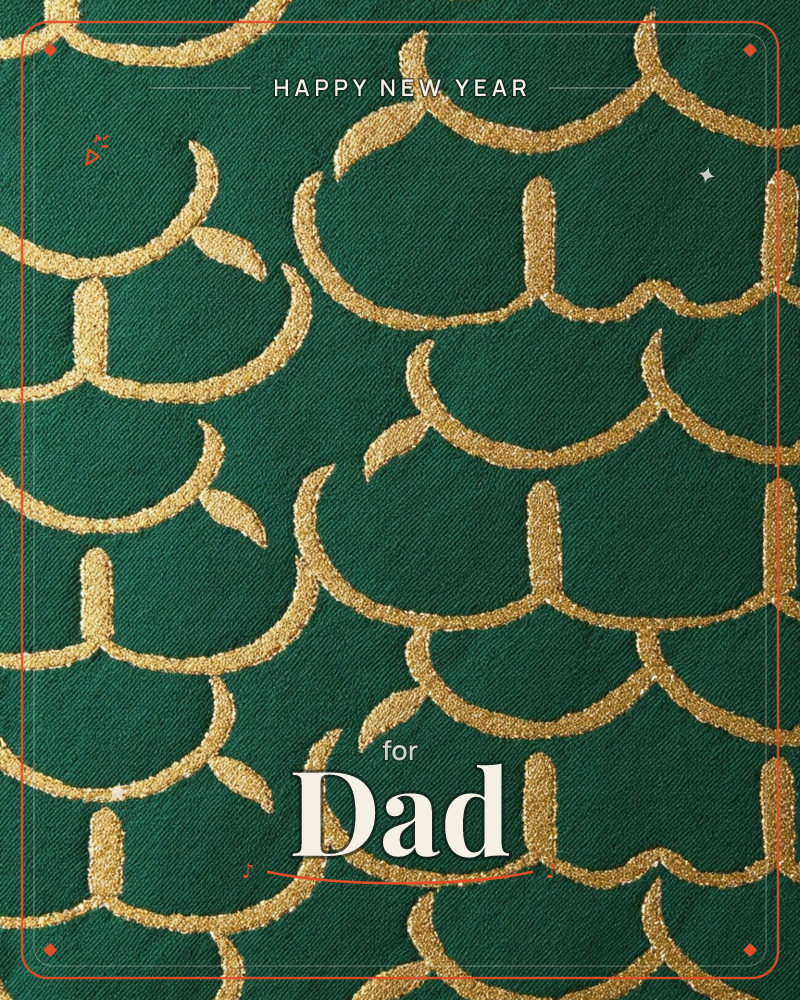 A close-up of rich emerald fabric printed with a repeating scalloped pattern in metallic gold, resembling overlapping fish scales or feathers, a new year e-card design