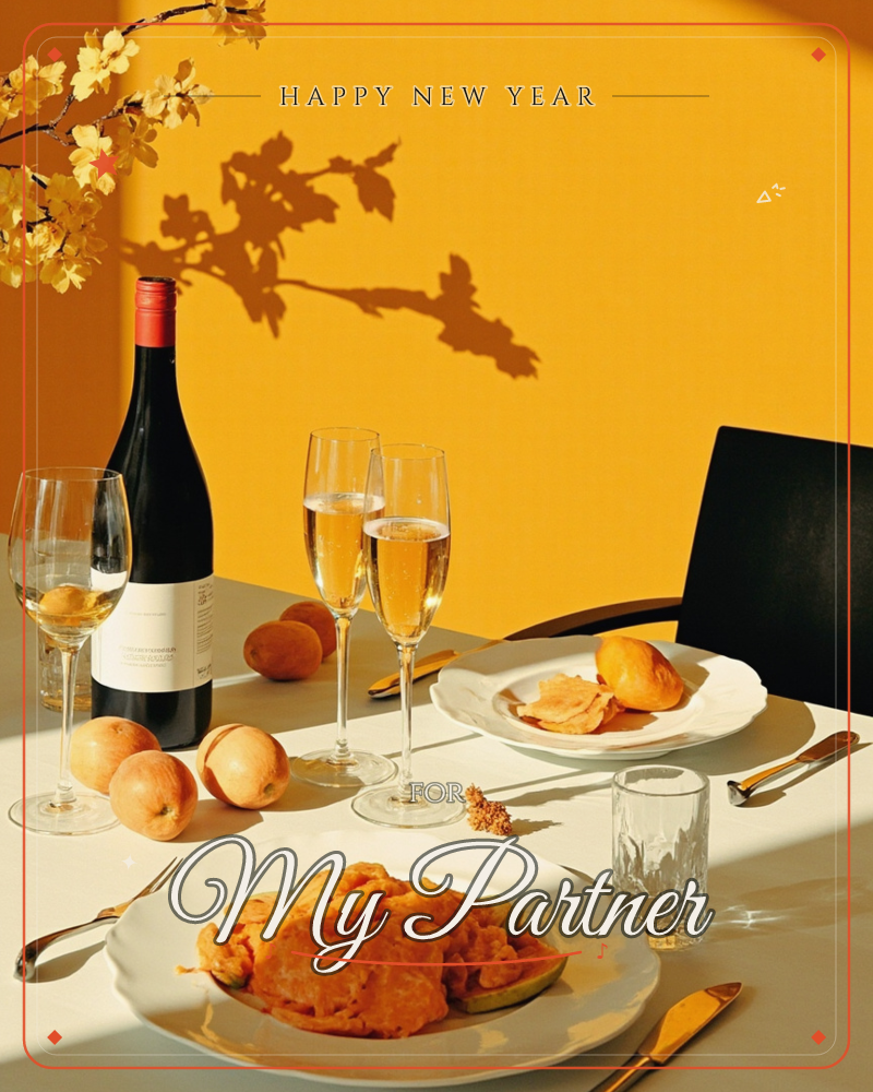 A sunlit table is set against a warm mustard wall, where a flowering branch casts a long dramatic shadow, a new year e-card design