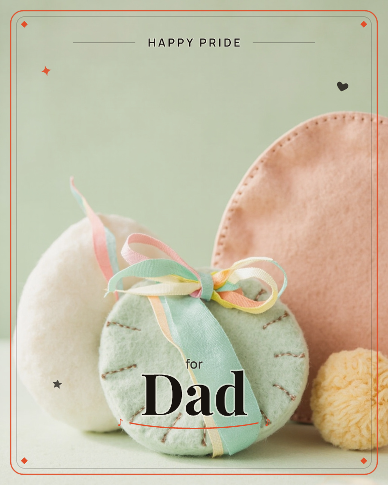 A soft still-life of handmade felt Easter eggs in mint, white and blush pink, hand-stitched with visible thread and tied with looping pastel ribbon in…, a pride e-card design
