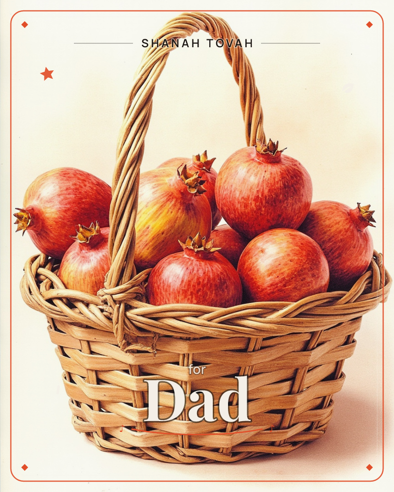 A woven wicker basket is piled high with ripe pomegranates, their crowned tops catching a soft, even light against a plain pale backdrop, a rosh hashanah e-card design
