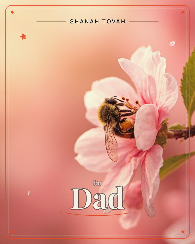 A fuzzy bee burrows into the centre of a pale pink blossom, its wings catching the light against a soft blurred background of dusky rose and gold, a rosh hashanah e-card design
