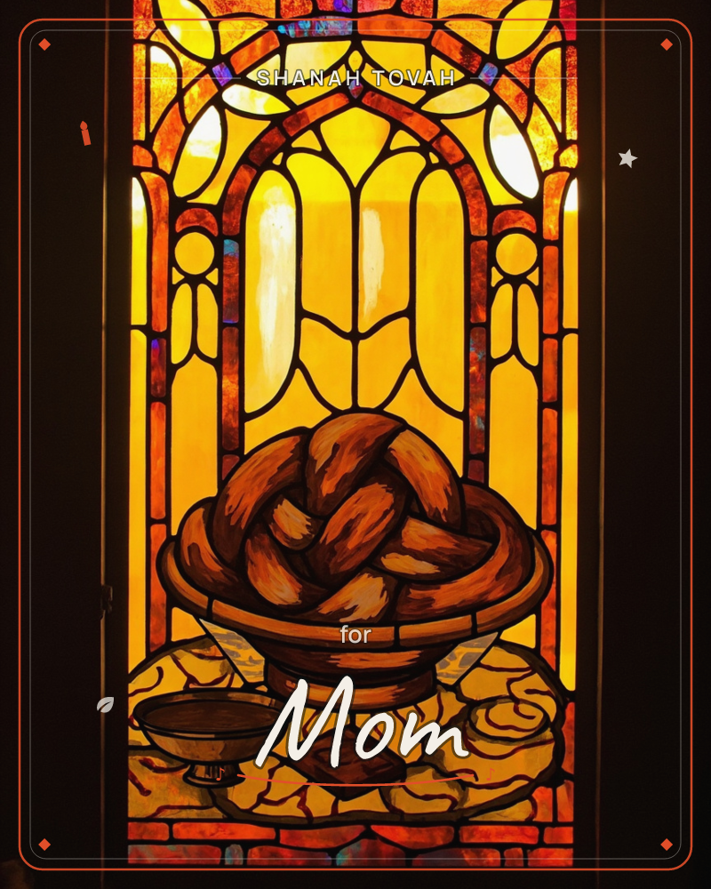A stained-glass style illustration glows amber and gold, framed by an arched window design with leaded lines and jewel-toned accents, a rosh hashanah e-card design