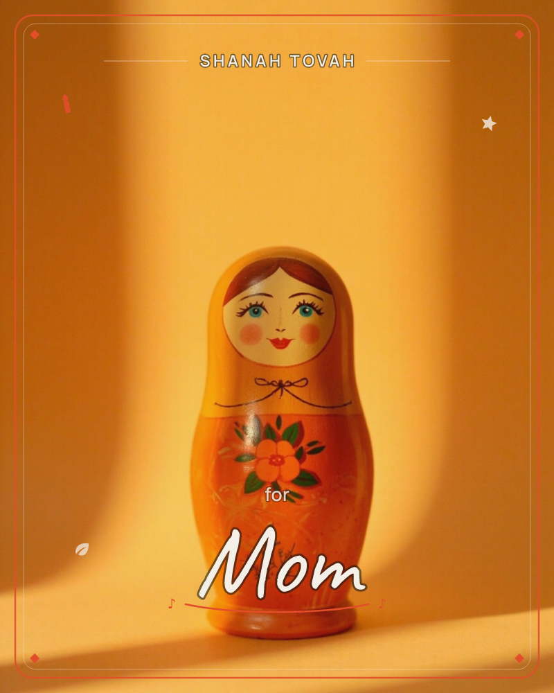 A single wooden nesting doll stands centre-frame against a warm amber backdrop, painted with rosy cheeks, blue eyes and a hand-painted orange flower on…, a rosh hashanah e-card design