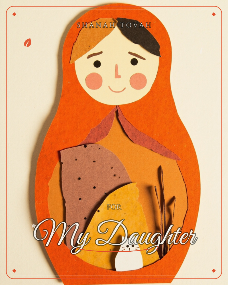 A paper-cut matryoshka doll sits in bright orange with a rosy-cheeked painted face, its rounded belly cut away to reveal a tiny layered diorama of…, a rosh hashanah e-card design