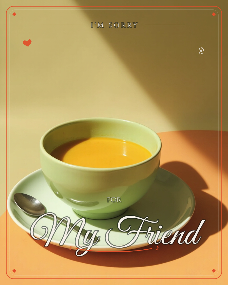 A sage-green bowl of bright orange-yellow soup sits on a matching saucer with a plain metal spoon, photographed on a burnt-orange tabletop against a…, a sorry e-card design