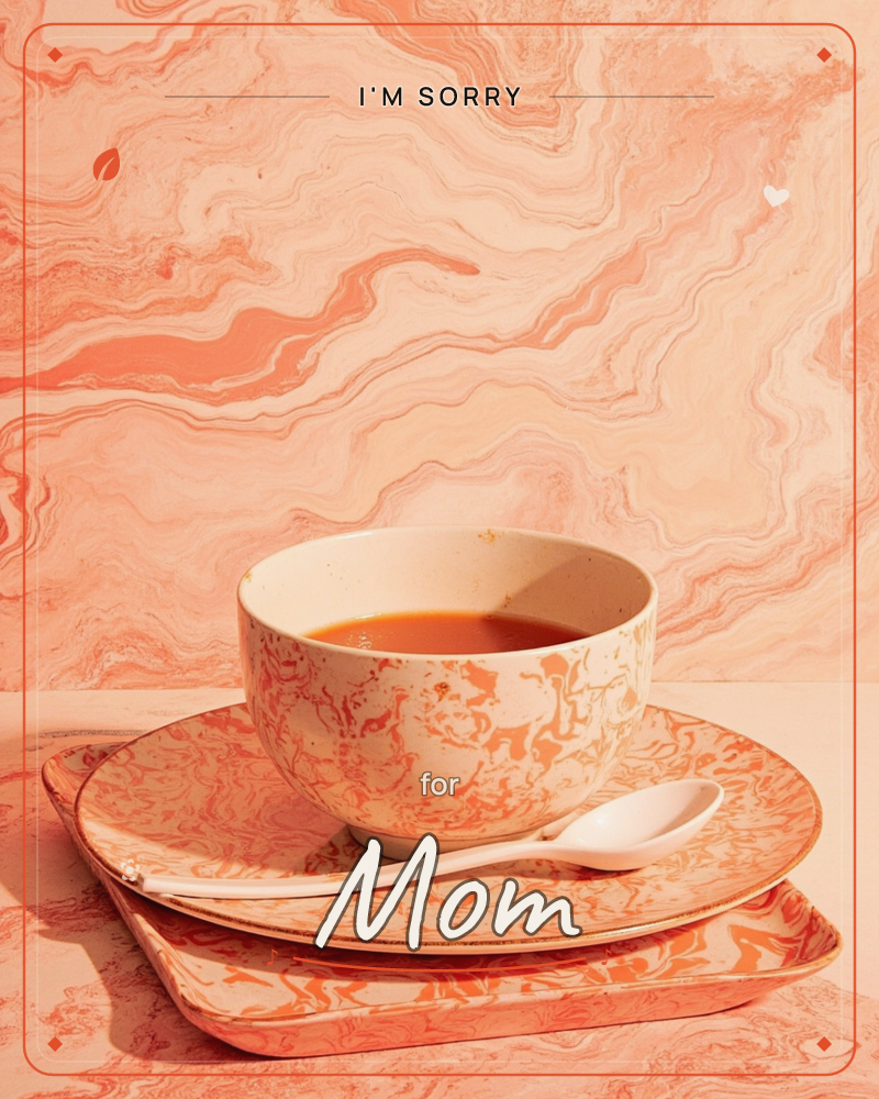 A marbled peach-and-cream bowl of soup sits on a stack of matching swirl-patterned plates, with a plain white spoon resting against its side, a sorry e-card design