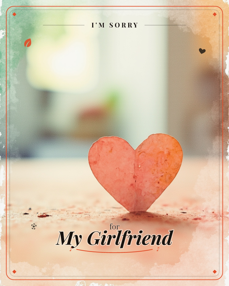 A small folded paper heart stands upright on a sandy, speckled surface, caught in soft, warm light, a sorry e-card design