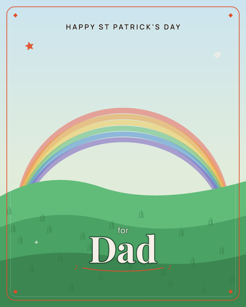 A rainbow arcing over rolling green Irish hills under a soft pale sky, with tufts of grass across the foreground, a st patrick's day e-card design