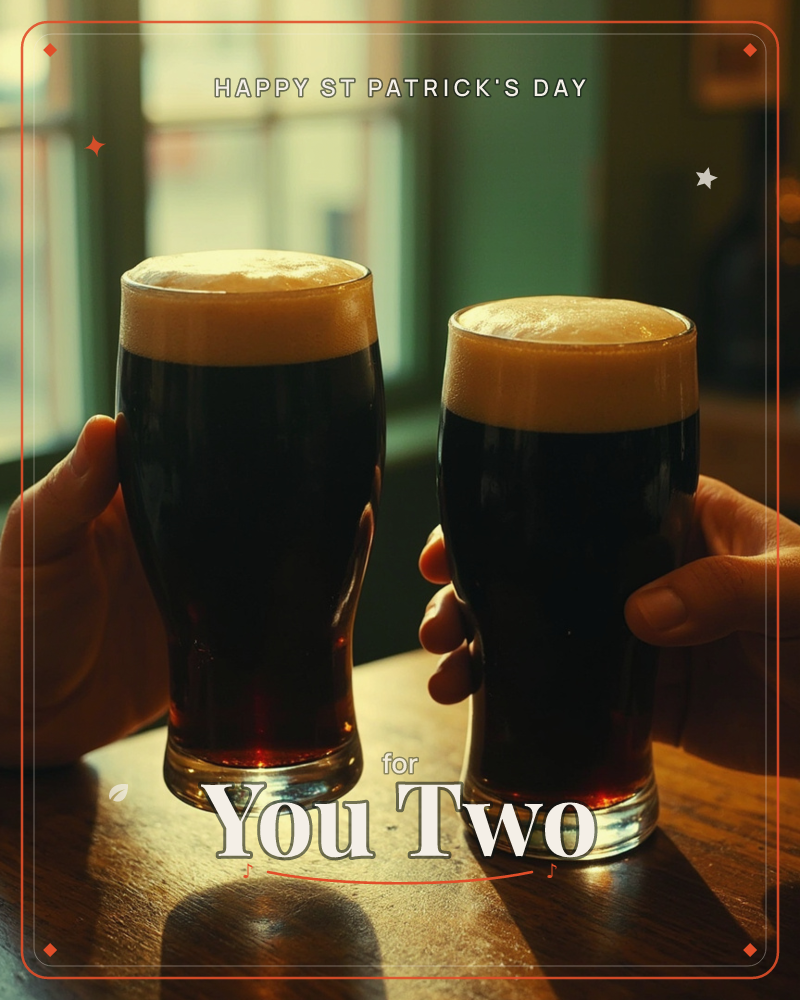 Two hands reach across a wooden pub table, each holding a tall glass of dark stout topped with a thick creamy head, a st patrick's day e-card design