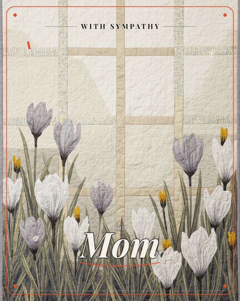 A quilted textile design shows a row of crocus flowers in lavender-grey and white rising from stitched grassy blades, set against a paneled cream…, a sympathy e-card design