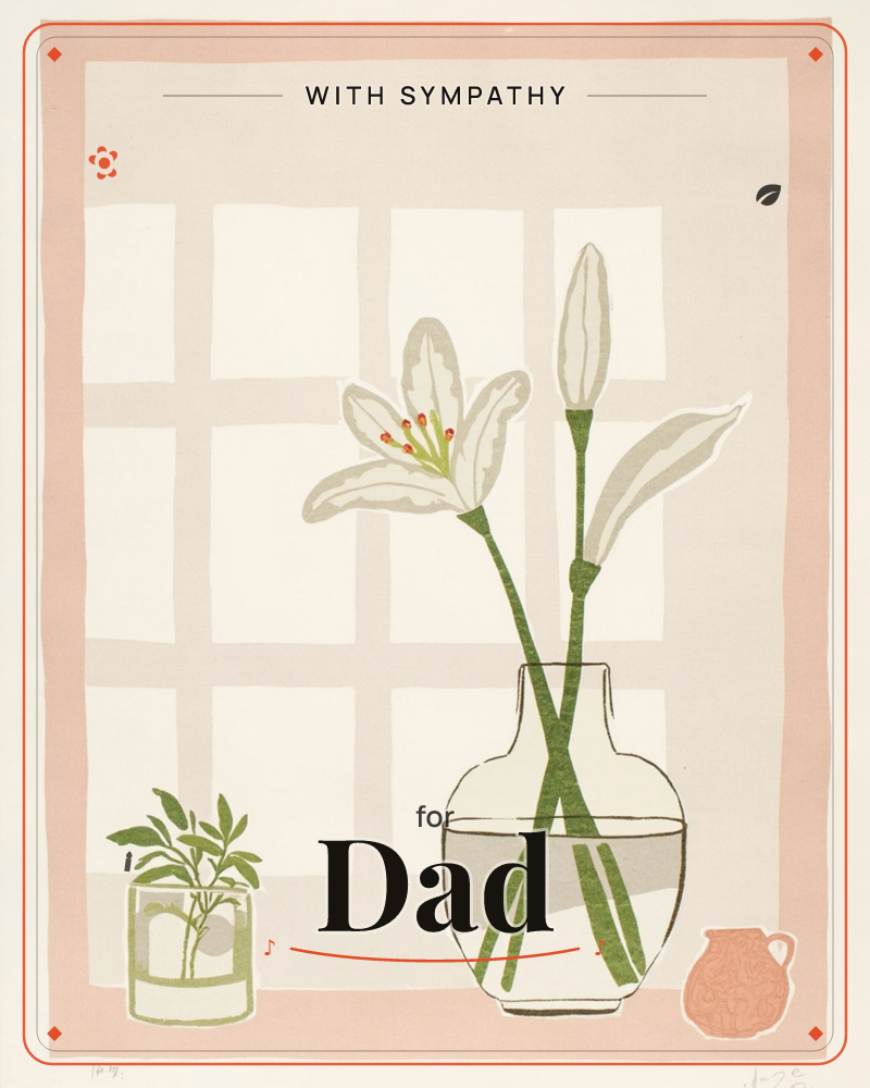 A tall glass vase holds two white lily blooms and an unopened bud, set against a paned window glowing with soft daylight, a sympathy e-card design