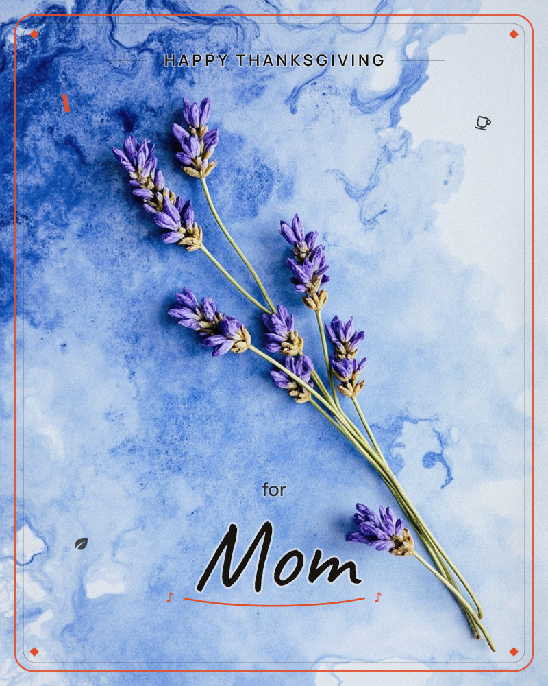 A few sprigs of lavender lie diagonally across a marbled blue background, their purple buds and slender green stems caught in sharp, even light, a thanksgiving e-card design