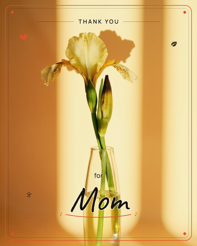 A single pale yellow iris and its unopened bud stand in a slender glass bud vase, set against a warm golden wall streaked with soft window-light shadows, a thankyou e-card design