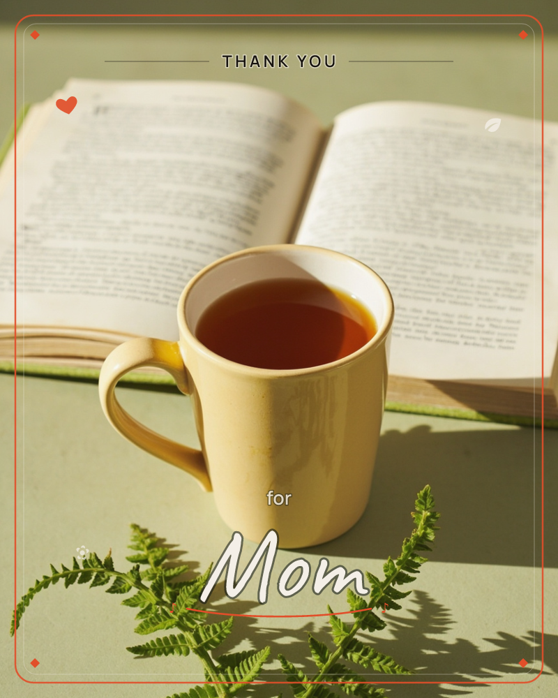 A yellow mug of dark tea sits in front of an open book with worn pages, all resting on a soft sage-green surface, a thankyou e-card design