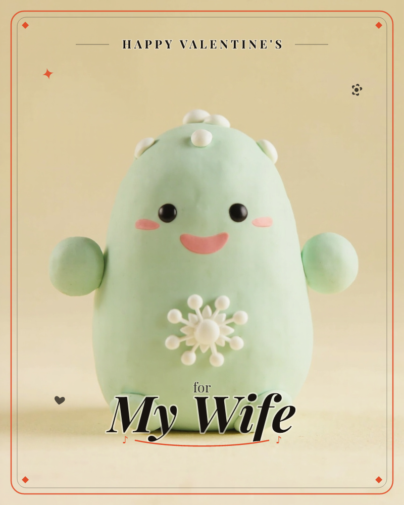 A rounded, egg-shaped mint-green creature with stubby limbs and a smiling pink mouth sits against a soft cream backdrop, a valentine e-card design