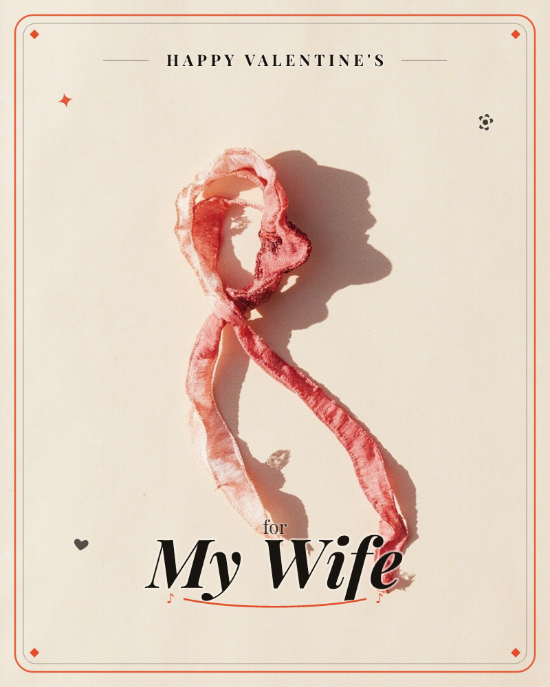 A single crumpled silk ribbon, dyed in mottled shades of pink and coral, lies loosely coiled against a plain cream background, a valentine e-card design