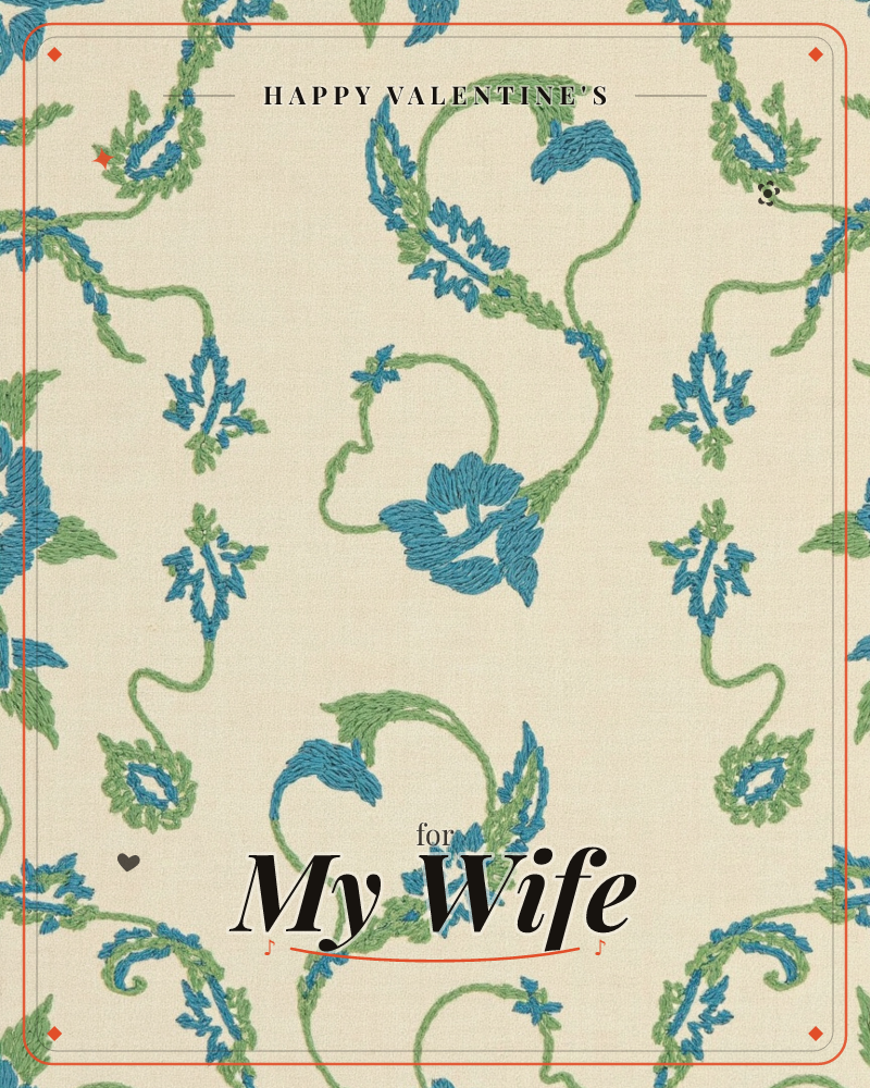 A close-up of embroidered fabric on a cream ground, with curling green vines and stitched blue flowers looping into paisley-like leaf shapes, a valentine e-card design