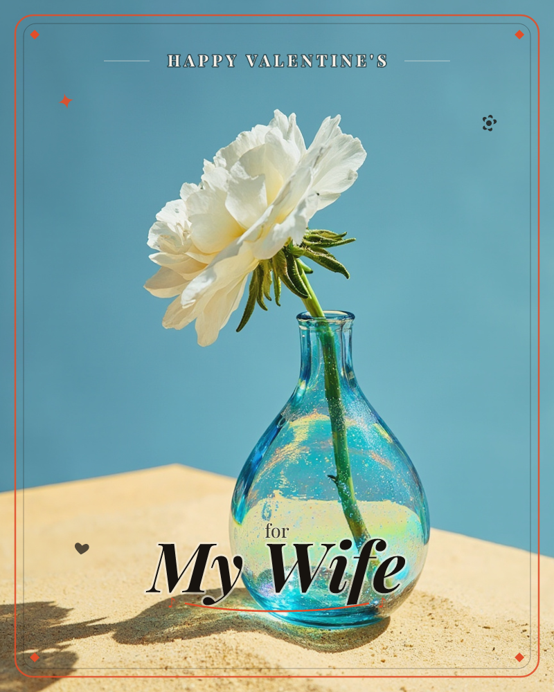 A single white peony leans out of a round, iridescent blue glass vase, set on a sandy ledge against a flat sky-blue background, a valentine e-card design