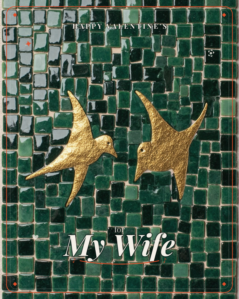 Two gilded swallows soar in profile across a mosaic of glossy emerald and moss-green tiles, their textured gold surfaces catching the light against the…, a valentine e-card design