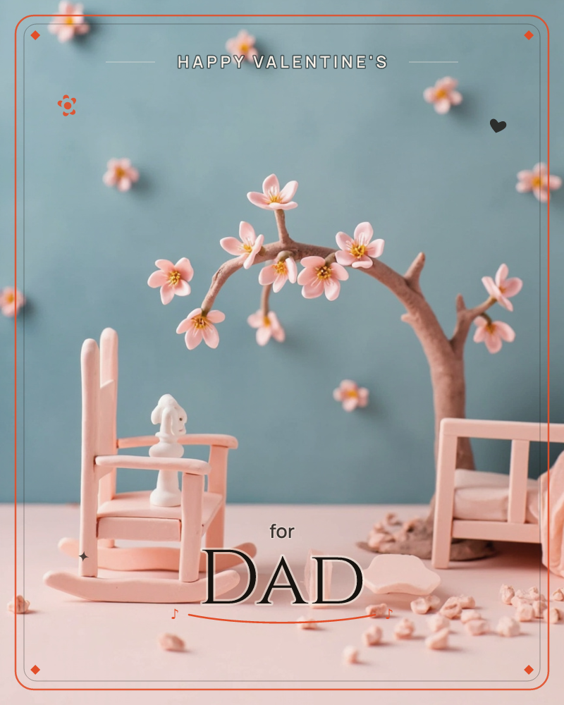 A miniature diorama shows a pale pink rocking chair with a tiny white rabbit figure perched on its seat, beneath an arching branch heavy with cherry…, a valentine e-card design