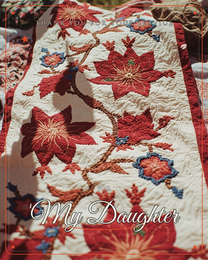 A close-up photograph of a hand-quilted table runner, its cream cotton stitched with a winding vine of deep red poinsettia-like blooms and small blue…, a veterans day e-card design