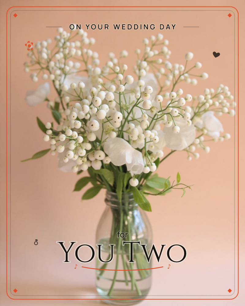 A glass jar holds a simple bouquet of white berry sprays and papery white blooms, their thin green stems visible through the water, a wedding e-card design